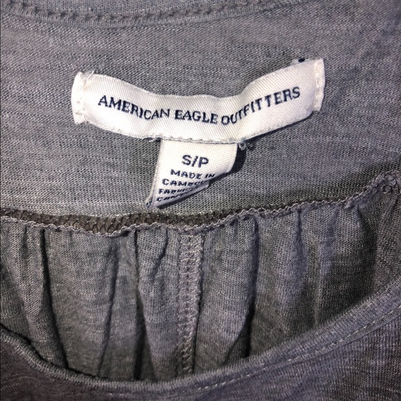 a loose grey tank top - Picture 2 of 3